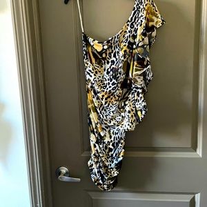 Womens Small Leopard Print one shoulder soft shirt.